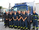 Gruppenbild der THW-Einsatzkräfte mit Hans-Joachim Fuchtel (MdB), Parlamentarischer Staatssekretär beim Bundesminister für wirtschaftliche Zusammenarbeit und Entwicklung.