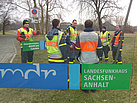 Lagebesprechenung im Stadtpark.